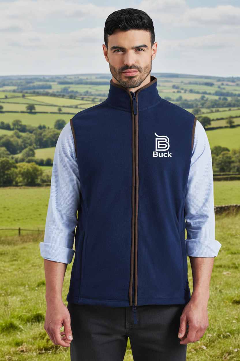 Navy gilet with Buck logo - countryside background